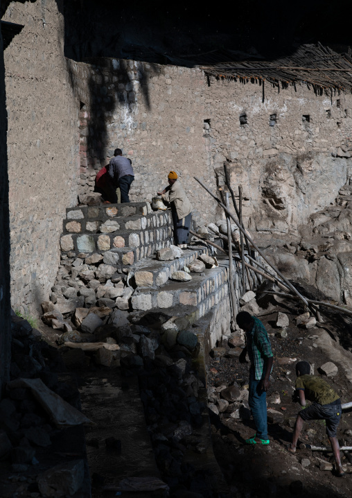 Workers repairing nakuto lab rock church, Amhara Region, Lalibela, Ethiopia