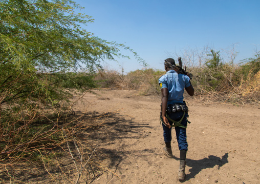 Ethiopian policeman in afambo lake, Afar Region, Afambo, Ethiopia