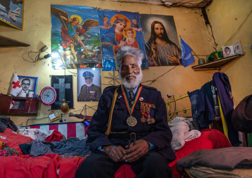 Veteran from the italo-ethiopian war in army uniform inside his home, Addis Abeba region, Addis Ababa, Ethiopia