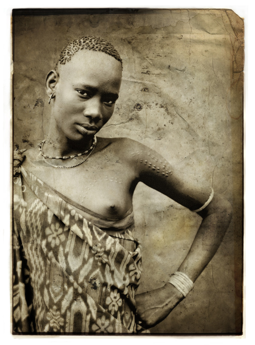 Sepia Portrait Of A Young Body Tribe Woman, Omo Valley, Ethiopia