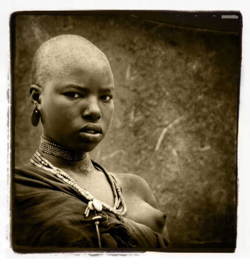 Bodi Tribe Shaved Head Woman Portrait Ethiopia