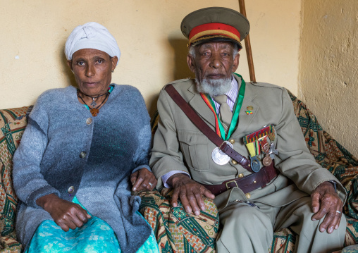 Ethiopian veteran from the italo-ethiopian war in army uniform with his wife, Addis Ababa Region, Addis Ababa, Ethiopia
