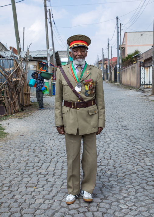 Ethiopian veteran from the italo-ethiopian war in army uniform in the street, Addis Ababa Region, Addis Ababa, Ethiopia