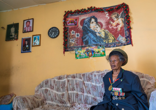 Ethiopian veteran woman from the italo-ethiopian war with a virgin mary decoration, Addis Ababa Region, Addis Ababa, Ethiopia