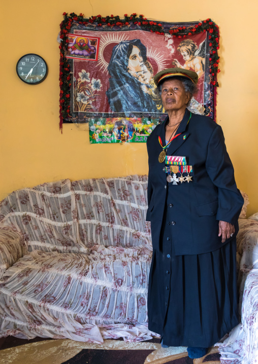 Ethiopian veteran woman from the italo-ethiopian war with a virgin mary decoration, Addis Ababa Region, Addis Ababa, Ethiopia