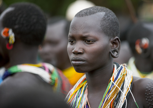 Suri tribe girl with enlarged earlobe, Kibish, Omo valley, Ethiopia
