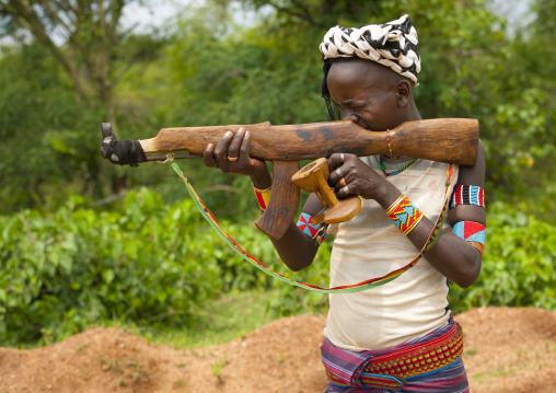 Bana Tribe  Man With A Wooden Kalshnikov, Key Afer, Omo Valley, Ethiopia