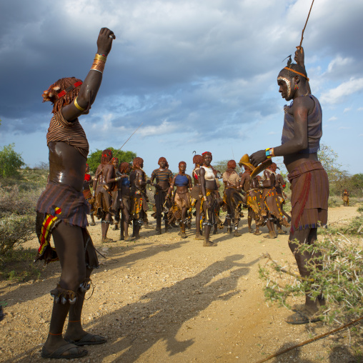 Whipping During Bull Jumping Ceremony, Turmi In Hamar Tribe, Omo Valley, Ethiopia