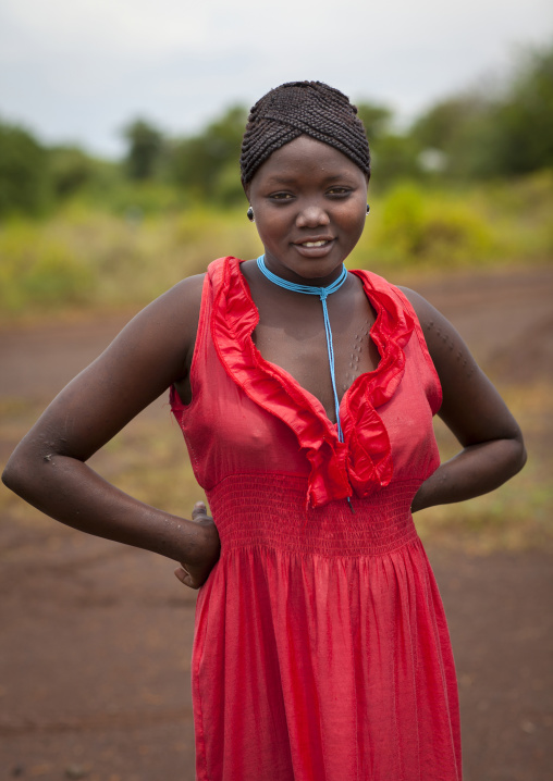 Bodi Tribe Woman With A Brand New Modern Dress, Hana Mursi, Omo Valley, Ethiopia
