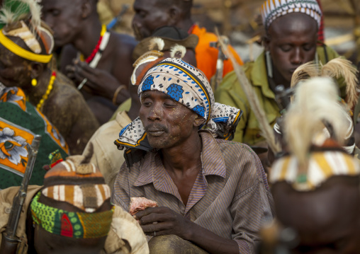 Dassanech Tribe Warriors Sharing Cow Meat During A Ceremony, Omorate, Omo Valley, Ethiopia
