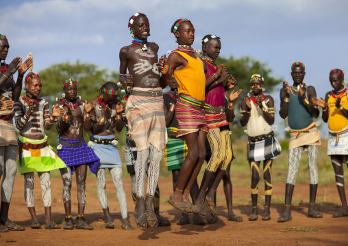 Bashada Tribe Men Dancing And Jumping, Dimeka, Omo Valley, Ethiopia