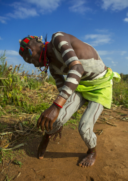 Bashada Tribe Man Making Body Painting, Dimeka, Omo Valley, Ethiopia