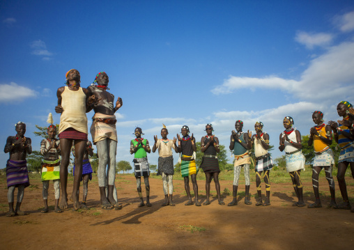 Bashada Tribe Men Dancing And Jumping, Dimeka, Omo Valley, Ethiopia