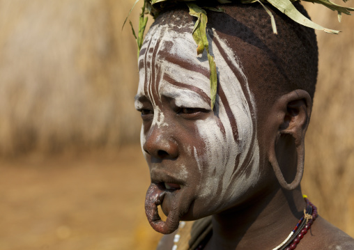 Mursi Woman With Extended Holes In Lip And Ear Portrait Ethiopia