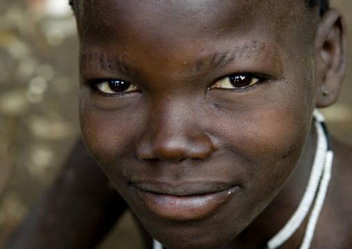 Close-up Portrait Of A Bashada Tribe Kid With Cut Eyebrows, Hana Mursi, Omo Valley, Ethiopia