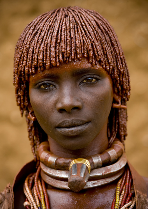 Portrait Of Hamar Tribe Woman With Traditional Stranded Hair Tied With Clay And Big Necklaces, Turmi, Omo Valley, Ethiopia