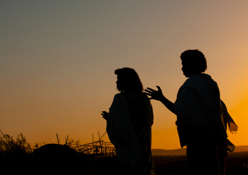 Afar tribe men at sunset, Assaita, Afar regional state, Ethiopia