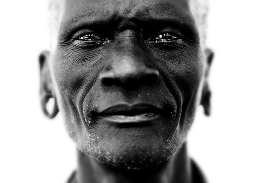 Black And White Close Up Portrait Of A Senior Mursi Tribe Man In Mago National Park, Omo Valley, Ethiopia