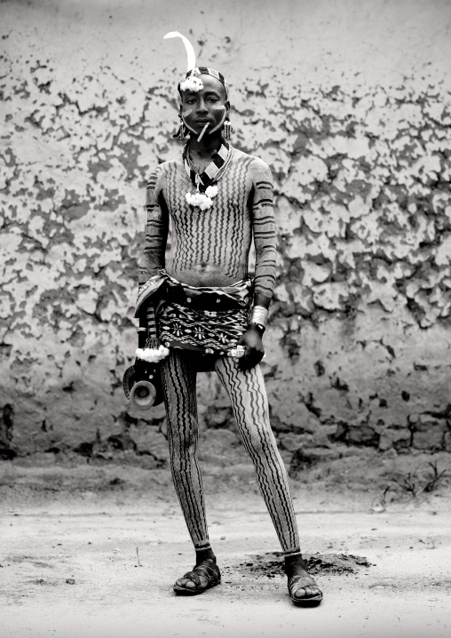 Hamar Tribe Man With White Body Painting, White Feather And Traditional Necklace In Turmi, Omo Valley, Ethiopia