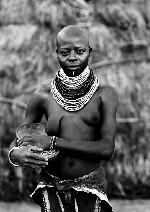 Black And White Portrait Of A Karo Tribe Woman Holding A Calabash, Korcho Village, Omo Valley, Ethiopia