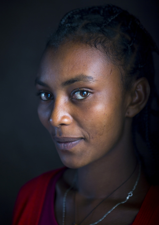 Young woman posing, Jemu, Omo valley, Ethiopia