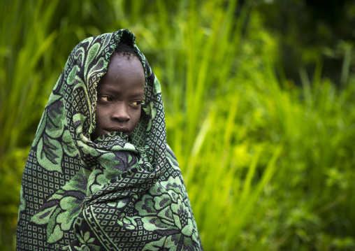 Suri girl in a plantation, Koka, Omo valley, Ethiopia