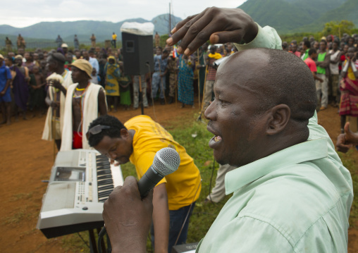 Singers at a Suri tribe ceremony, Kibish, Omo valley, Ethiopia