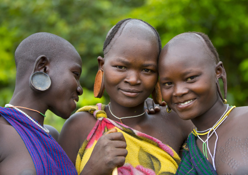 Suri tribe women with enlarged earlobe, Kibish, Ethiopia