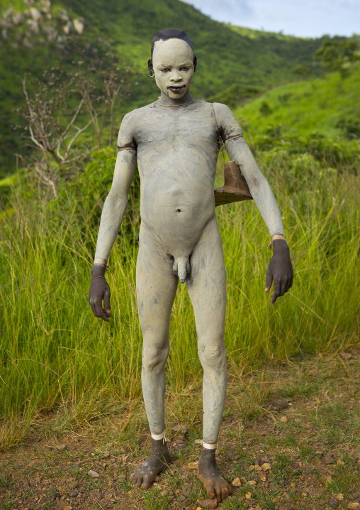 Suri tribe shepherd with body paintings for camouflage, Tulgit, Omo valley, Ethiopia