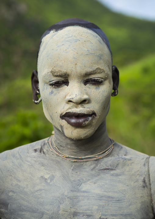 Suri tribe shepherd with body paintings for camouflage, Tulgit, Omo valley, Ethiopia