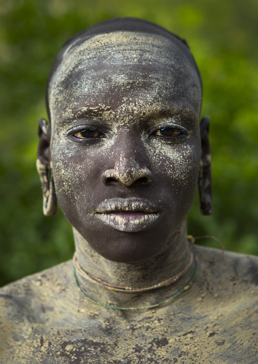 Suri tribe shepherd with body paintings for camouflage, Tulgit, Omo valley, Ethiopia