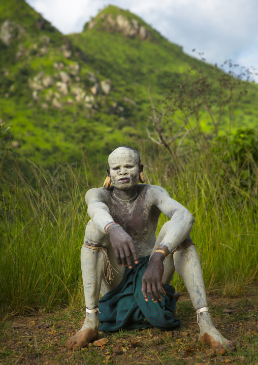 Suri tribe shepherd with body paintings for camouflage, Tulgit, Omo valley, Ethiopia