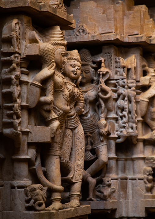 Golden coloured sandstone statues inside the jain temple, Rajasthan, Jaisalmer, India