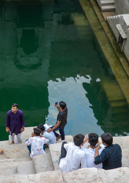 Indian people in Toorji ka Jhalra stepwell, Rajasthan, Jodhpur, India