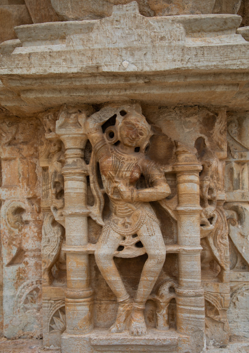 Carved idol on the wall of Vijaya Stambha tower of victory at Chittorgarh fort, Rajasthan, Chittorgarh, India