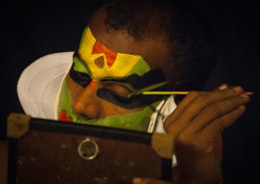 Kathakali Dancer Applying Make-up, Kochi, India