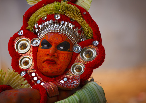 Man Dressed For Theyyam Ritual With Traditional Painting On His Face, Thalassery, India