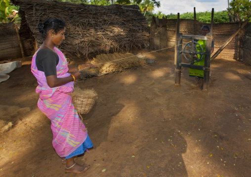 Indian Women Making Ropes With A Old Weaving Loom In A Village Near Madurai, India