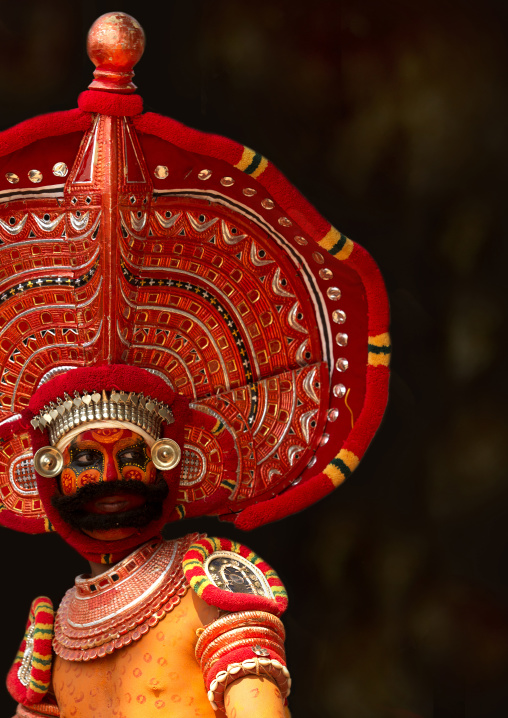 Man Dressed For Theyyam Ritual With Traditional Painting On His Face, Thalassery, India