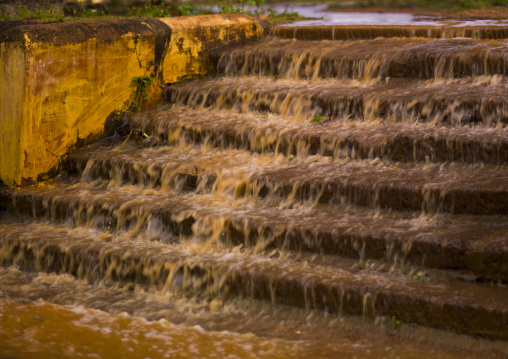 Rainstorm Flowing Over Stairs Forming A Small Waterfall, Kanadukathan Chettinad, India
