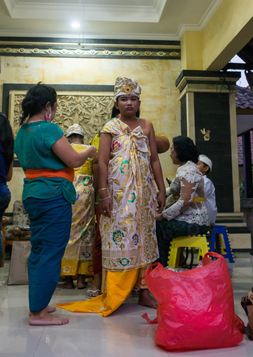 A Teenager Boy Dressed In Traditional  Costume  Before A Tooth Filing Ceremony