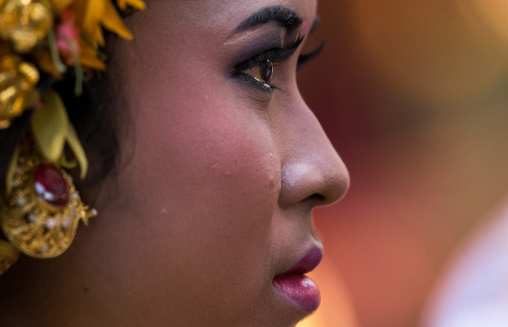 A Teenager Girl In Traditional  Costume Crying Before A Tooth Filing Ceremony