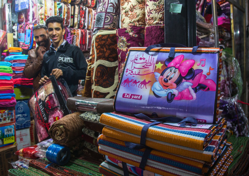 vendors in the bazaar with minnie mouse logos on blankets, Hormozgan, Bandar Abbas, Iran