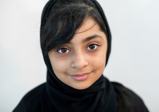 portrait of a young girl in traditional bandari clothing during a wedding ceremony, Hormozgan, Bandar-e Kong, Iran