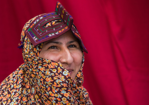 a bandari woman wearing a traditional mask called the burqa at panjshambe bazar thursday market, Hormozgan, Minab, Iran
