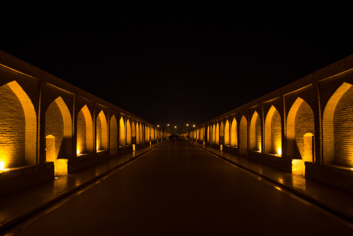 a view of the si-o-seh bridge at night highlighting the 33 arches, Isfahan Province, isfahan, Iran