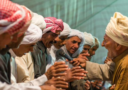 men singing during a wedding ceremony, Qeshm Island, Tabl , Iran
