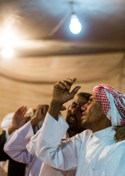 men singing during a wedding ceremony, Qeshm Island, Tabl , Iran