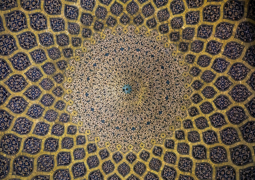 Ceiling with its intricate and elaborate patterns in sheikh lotfollah mosque, Isfahan province, Isfahan, Iran