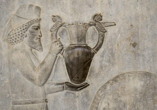Tribute bearers bas-relief in apadana palace, Fars province, Persepolis, Iran